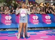 <p>Superwoman Lilly Singh paired a denim mini skirt and long duster with an inspiring T-shirt. </p>