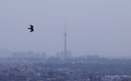 Buildings are shrouded by smog in New Delhi, India, May 2, 2018. REUTERS/Adnan Abidi