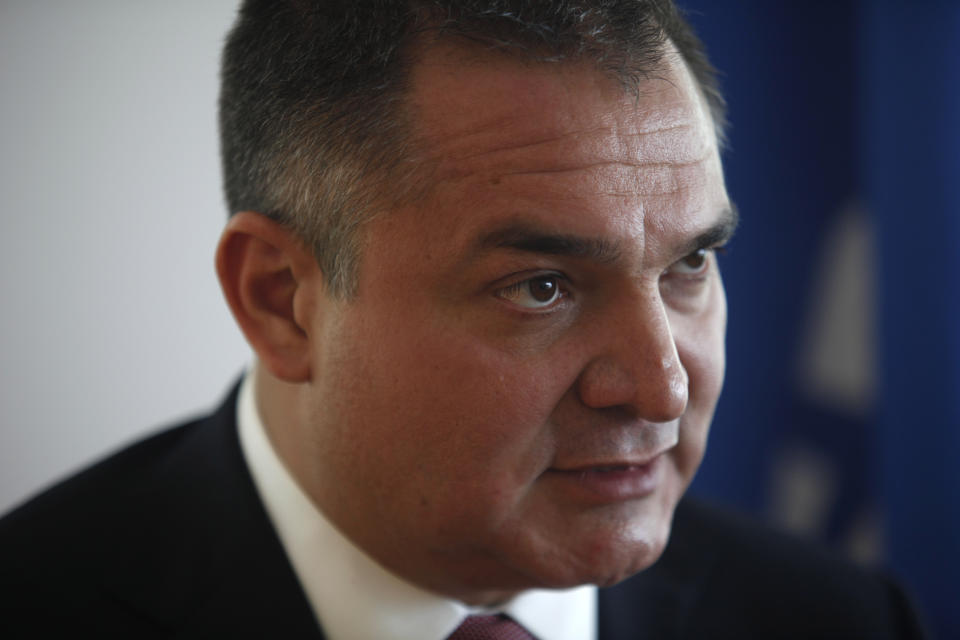 In this Sept. 3, 2009 file photo, Mexico's, Genaro Garcia Luna speaks during an interview with the Associated Press in Mexico City. The former Federal Secretary of Public Safety was arrested in Dallas Monday, Dec. 9, 2019, on charges of cocaine trafficking and making false statements. The indictment claims that Garcia Luna allegedly received millions of dollars in bribes from the Sinaloa Cartel. (AP Photo/Dario Lopez-Mills, File)