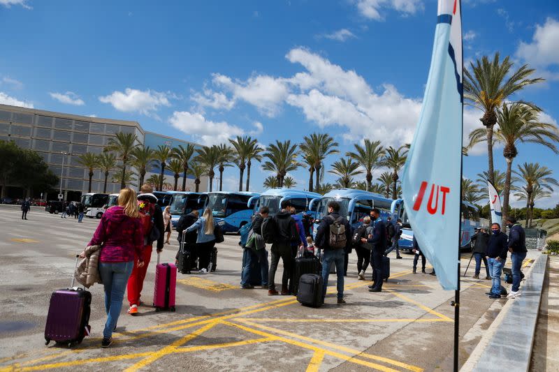 Tourists from Germany arrive at Palma de Mallorca Airport