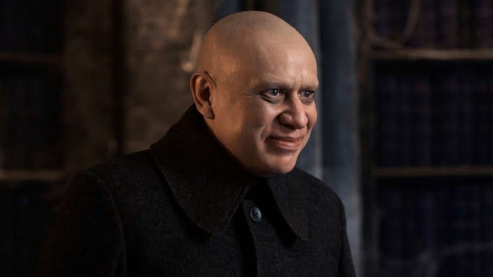Fred Armisen as Uncle Fester in Wednesday.