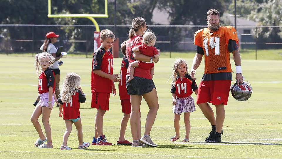 Fitzpatrick is greeted by his family after training camp during his time with the Tampa Bay Buccaneers in 2018. - Don Juan Moore/Getty Images