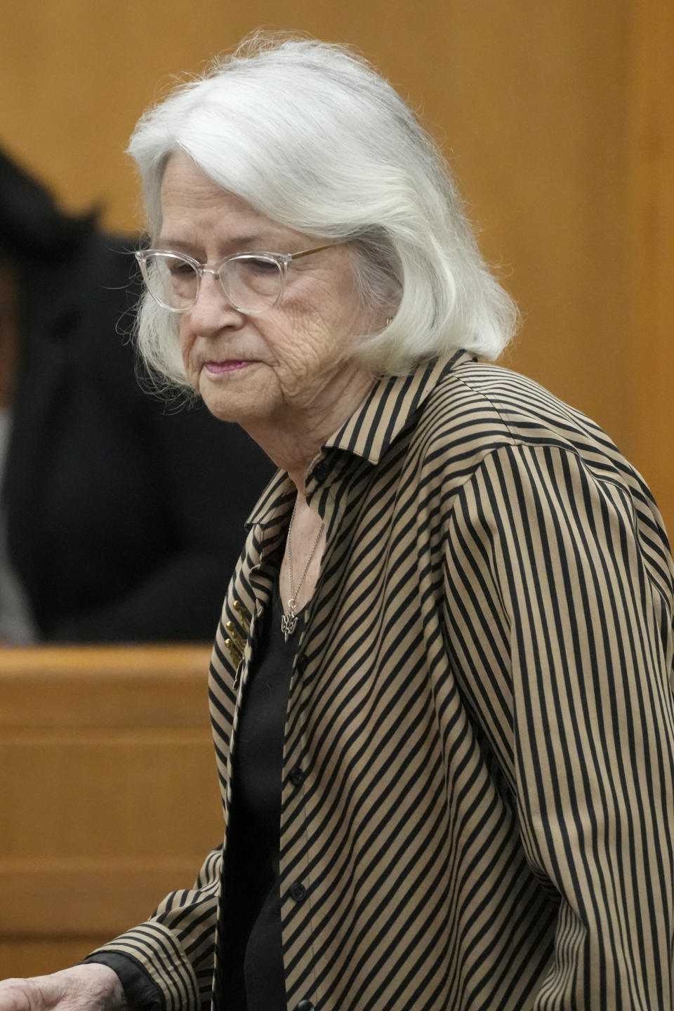 Dorothy Triplett a Jackson resident approaches the witness stand to testify during a hearing, Wednesday, May 10, 2023, in Hinds County Chancery Court in Jackson, Miss., where a judge heard arguments about a Mississippi law that would create a court system with judges who would be appointed rather than elected. (AP Photo/Rogelio V. Solis)