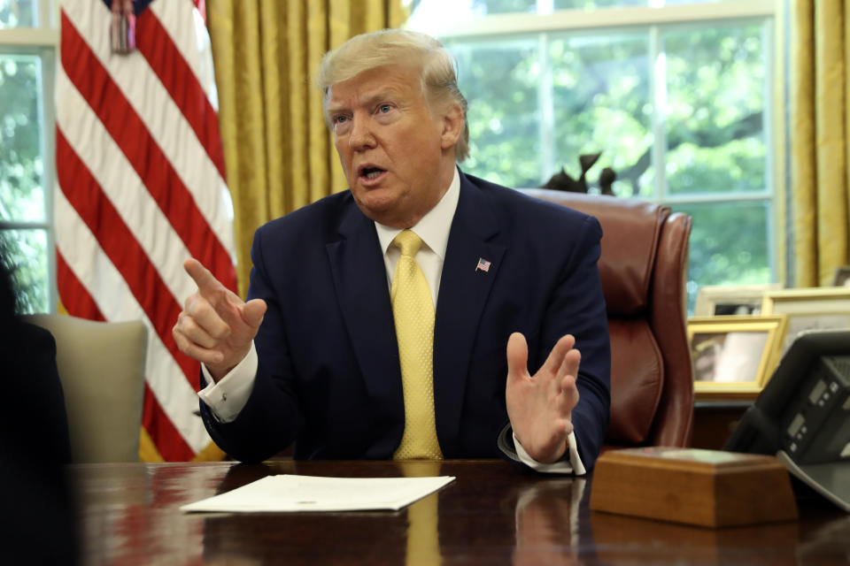 President Donald Trump meets with Chinese Vice Premier Liu He in the Oval Office of the White House in Washington, Friday, Oct. 11, 2019. (AP Photo/Andrew Harnik)