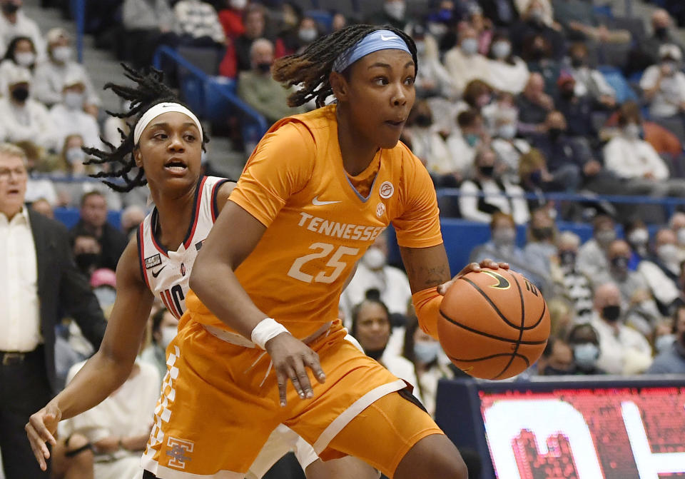 FILE - Tennessee's Jordan Horston (25) drives past Connecticut's Christyn Williams in the first half of an NCAA college basketball game Feb. 6, 2022, in Hartford, Conn. Horston missed the final 15 games for Tennessee due to injury last season after leading them to an 18-1 start. (AP Photo/Jessica Hill, File)