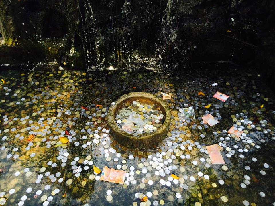 Image of money in a fountain