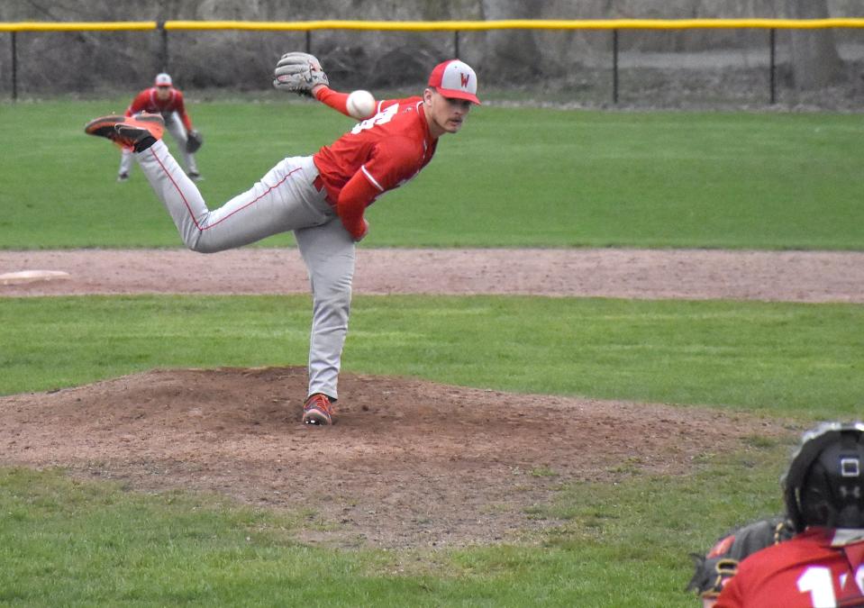 Oppenheim-Ephratah-St. Johnsville senior Mason Snell delivers a pitch against Schoharie Monday at Soldiers and Sailors Park. Snell struck out 15 batters and hit a leadoff home run for the Wolves.