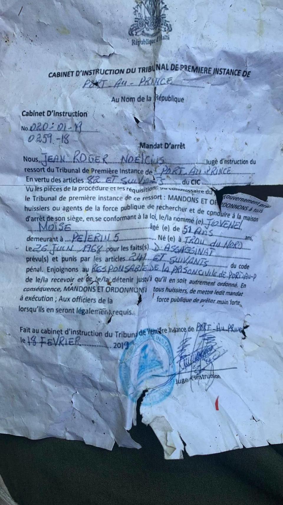 The pretext for the ‘arrest’ of Haiti President Jovenel Moïse was a dubious 2019 warrant issued against Moïse ‘for assassination’ by Investigative Judge Jean Roger Noelcius. A crumbled copy of the warrant was found in one of the homes occupied by some of the suspects in Port-au-Prince.
