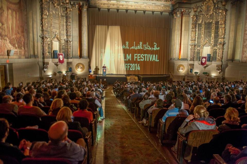 A full house watches the stage at the 2014 Arab Film Festival.