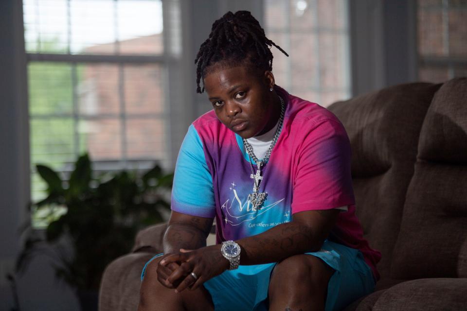 Da'maryious Dorsey sits in the living room at a friend's home in Hermitage, Tenn., Saturday, July 8, 2023. Dorsey has been applying for jobs, trying to move forward from his past, but some jobs won't hire someone with a felony record.
