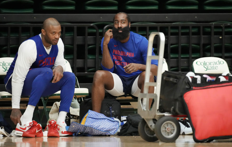 Philadelphia 76ers forward P.J. Tucker, left, talks with guard James Harden during the NBA basketball team's practice on Thursday, Oct. 5, 2023, in Fort Collins, Colo. (AP Photo/David Zalubowski)