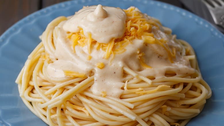 Close-up of béchamel sauce on plated pasta