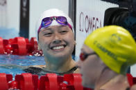 Siobhan Bernadette Haughey, of Hong Kong, reacts after winning the women's 100-meter freestyle semifinal at the 2020 Summer Olympics, Thursday, July 29, 2021, in Tokyo, Japan. (AP Photo/Charlie Riedel)