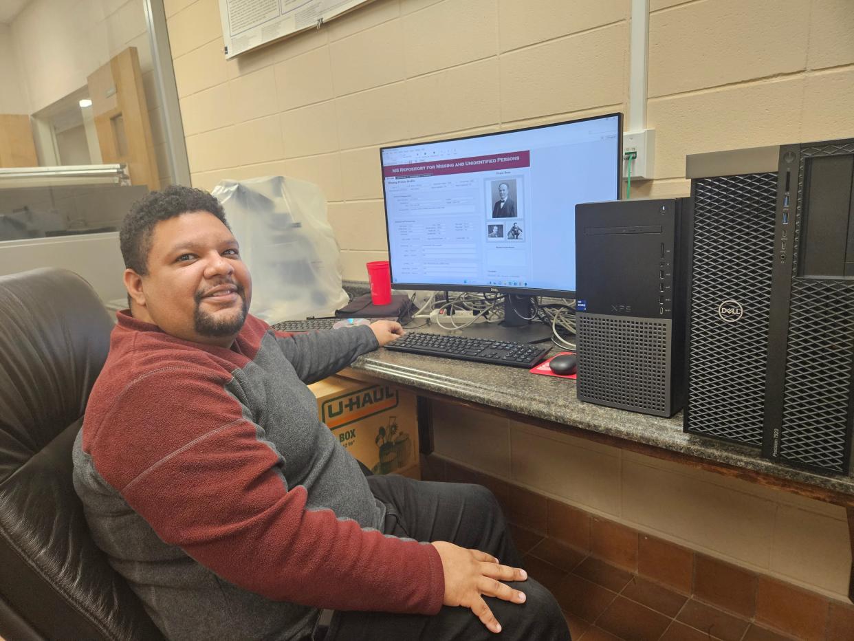 Mississippi State University Professor Jesse Goliath shows the database he built for people in Mississippi who are missing and bodies that are unidentified. To date, there are more than 1,000 names entered in the database.