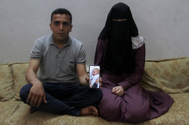 Separated by Israeli checkpoint, Gazan parents yearn to see their infant