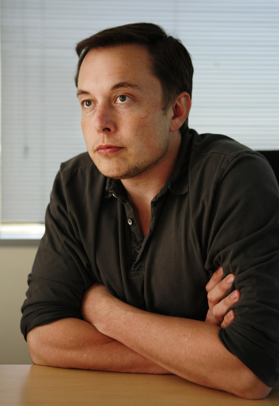 FILE - Tesla CEO Elon Musk is seen at Tesla headquarters in San Carlos, Calif., Tuesday, July 21, 2009. Many people are puzzled on what a Elon Musk takeover of Twitter would mean for the company and even whether he’ll go through with the deal. If the 50-year-old Musk’s gambit has made anything clear it’s that he thrives on contradiction. (AP Photo/Paul Sakuma, File)