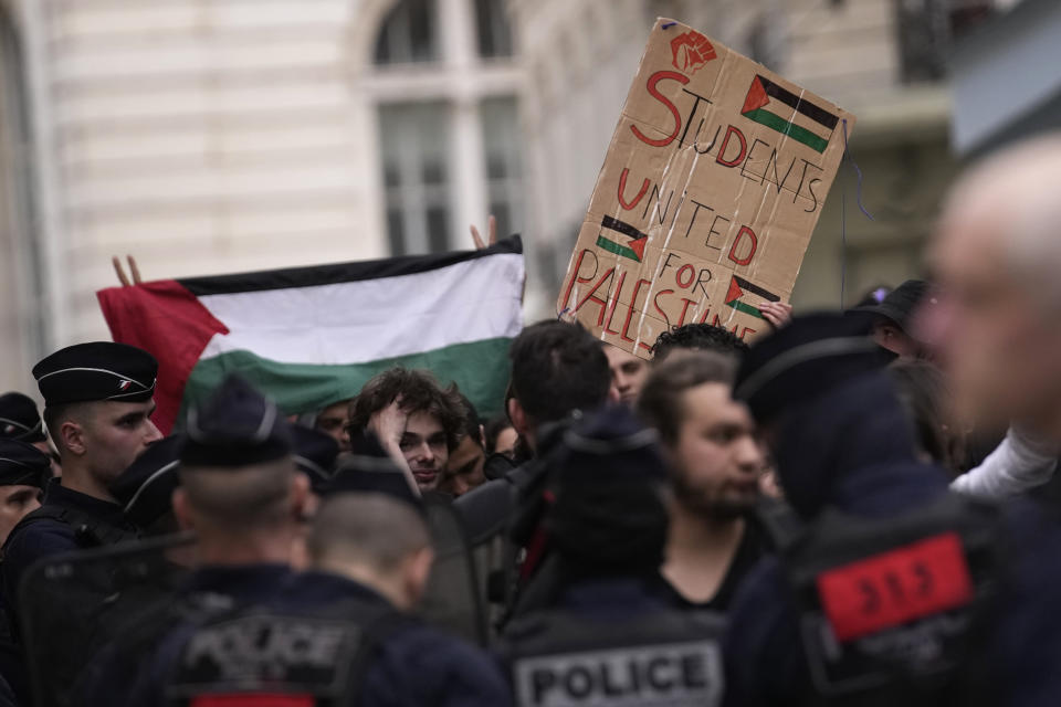 Students demonstrate outside La Sorbonne university, Monday, April 29, 2024 in Paris. About 100 Pro-Palestinian students demonstrate near the Sorbonne university in Paris. The demonstration came on the heels of protests last week at another Paris-region school, Sciences Po. (AP Photo/Christophe Ena)