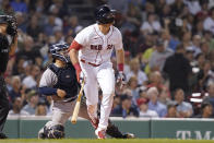 Boston Red Sox's Triston Casas watches his two-run home run, next to New York Yankees catcher Jose Trevino during the second inning of a baseball game Tuesday, Sept. 13, 2022, in Boston. (AP Photo/Steven Senne)