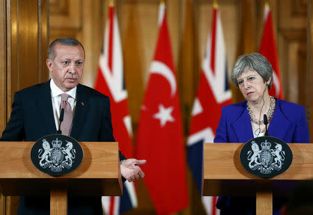 Turkish President Tayyip Erdogan and Britain's Prime Minister Theresa May attend a news conference after their meeting at Downing Street in London, Britain May 15, 2018. Cem Oksuz/Presidential Palace/Handout via REUTERS 