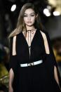 US supermodel Gigi Hadid walks the Lanvin catwalk in Paris with her sister Bella