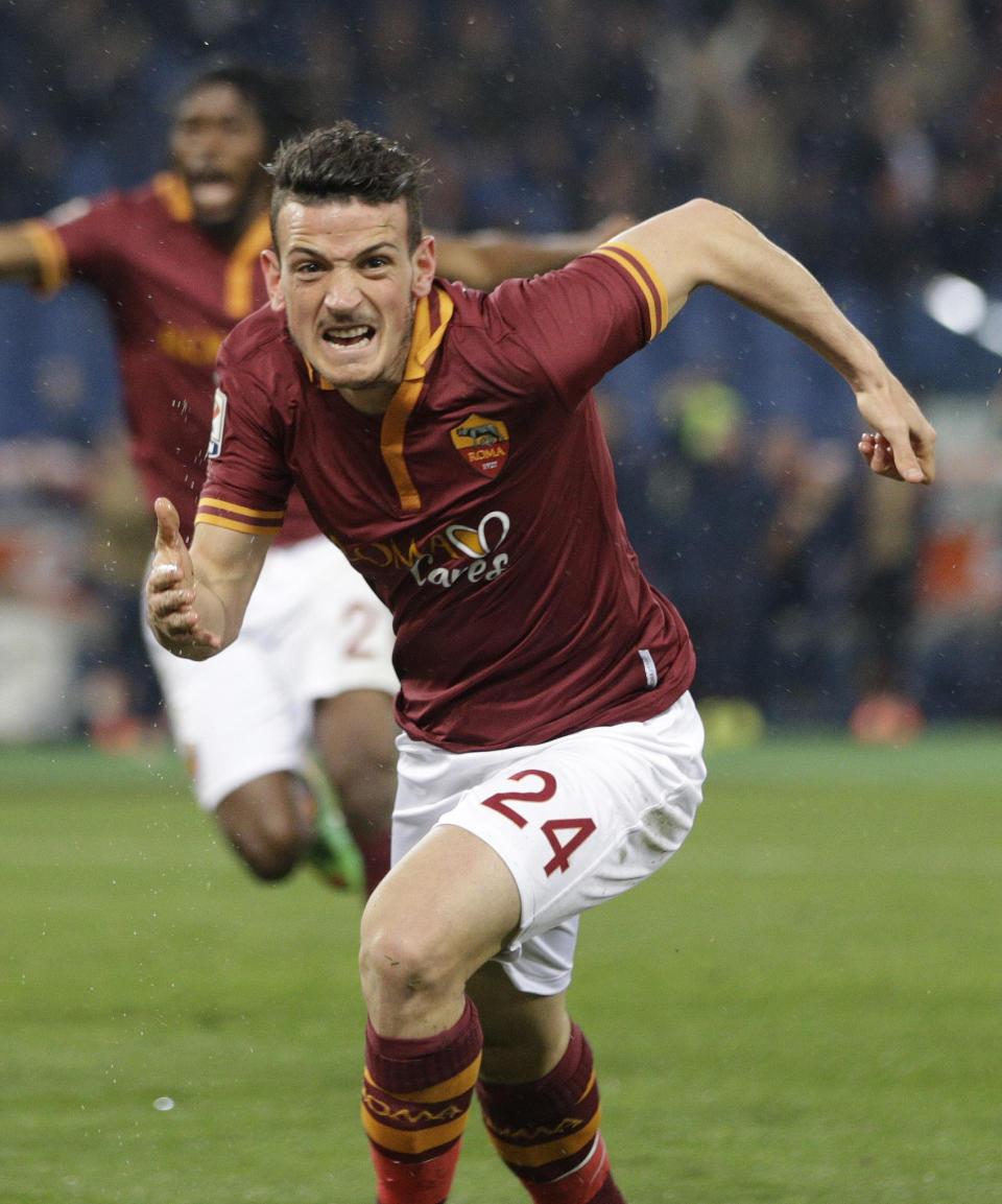 AS Roma midfielder Alessandro Florenzi celebrates after he scored during a Serie A soccer match between AS Roma and Torino, at Rome's Olympic Stadium, Tuesday, March 25, 2014. (AP Photo/Andrew Medichini)