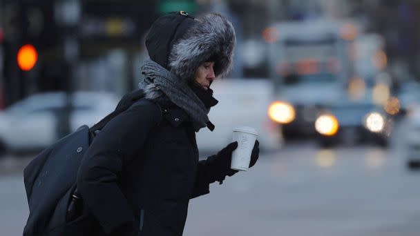 PHOTO: A pedestrian crosses the street on a cold winter morning in Boston, Feb. 3, 2023. (Brian Snyder/Reuters)