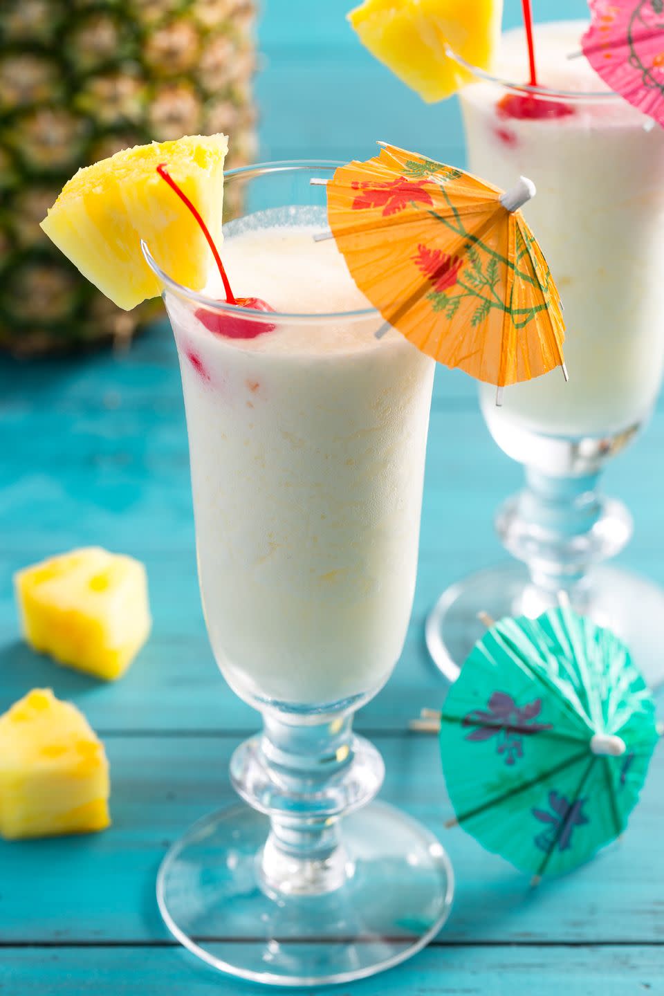 <p>Is it even a piña colada without an umbrella in it?</p><p>Get the recipe from <a href="https://www.delish.com/cooking/recipe-ideas/recipes/a4262/pina-colada-drinks-cocktails/" rel="nofollow noopener" target="_blank" data-ylk="slk:Delish;elm:context_link;itc:0;sec:content-canvas" class="link ">Delish</a>.<br></p>