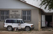 Children stand in the courtyard of the Maison La Providence de Dieu orphanage it Ganthier, Croix-des-Bouquets, Haiti, Sunday, Oct. 17, 2021, where a gang abducted 17 missionaries from a U.S.-based organization. The 400 Mawozo gang, notorious for brazen kidnappings and killings took the group of 16 U.S. citizens and one Canadian, after a trip to visit the orphanage. (AP Photo/Joseph Odelyn)