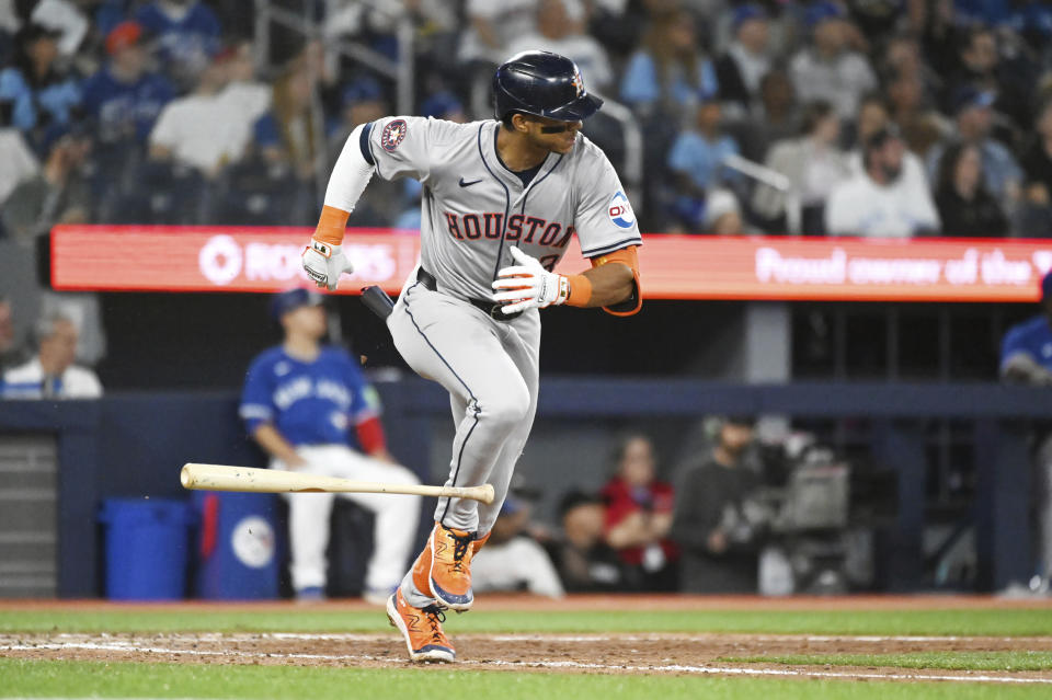 Houston Astros' Jeremy Pena (3) hits a double against the Toronto Blue Jays during the ninth inning of a baseball game, Tuesday, July 2, 2024, in Toronto. (Jon Blacker/The Canadian Press via AP)