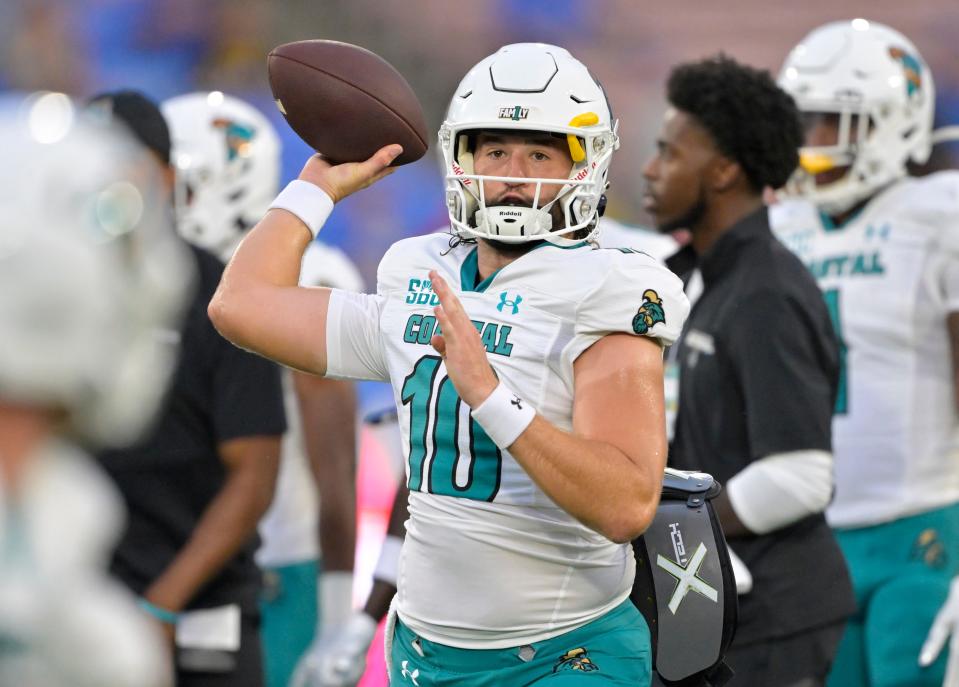 Sep 2, 2023; Pasadena, California, USA; Coastal Carolina Chanticleers quarterback Grayson McCall (10) warms up prior to the game against the UCLA Bruins at Rose Bowl. Mandatory Credit: Jayne Kamin-Oncea-USA TODAY Sports