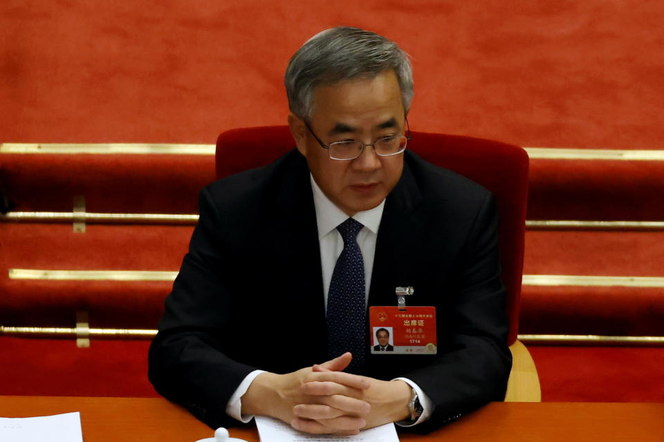 Chinese Vice Premier Hu Chunhua attends the opening session of the National People's Congress (NPC) at the Great Hall of the People in Beijing, China March 5, 2021. REUTERS/Carlos Garcia Rawlins