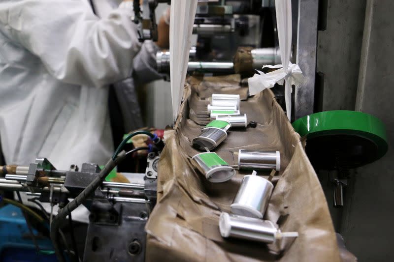 FILE PHOTO: Lithium ion batteries are seen on a production line inside a factory in Dongguan