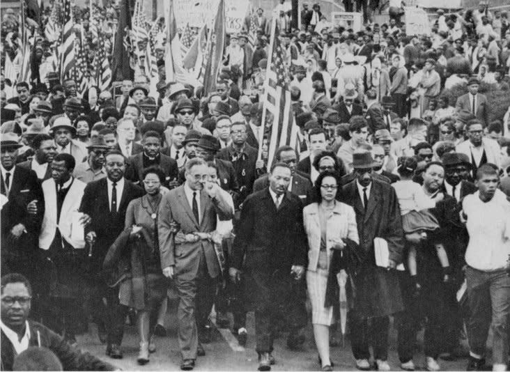 Dr. Martin Luther King leads an estimated 10,000 or more civil-rights marchers out on last leg of their Selma-to-Montgomery march on March 25,1965. Later that day, civil rights worker Viola Liuzzo of Detroit, 39, was killed by the Ku Klux Klan on a road near Selma, Ala., while shuttling marchers back to Montgomery. UPI File Photo