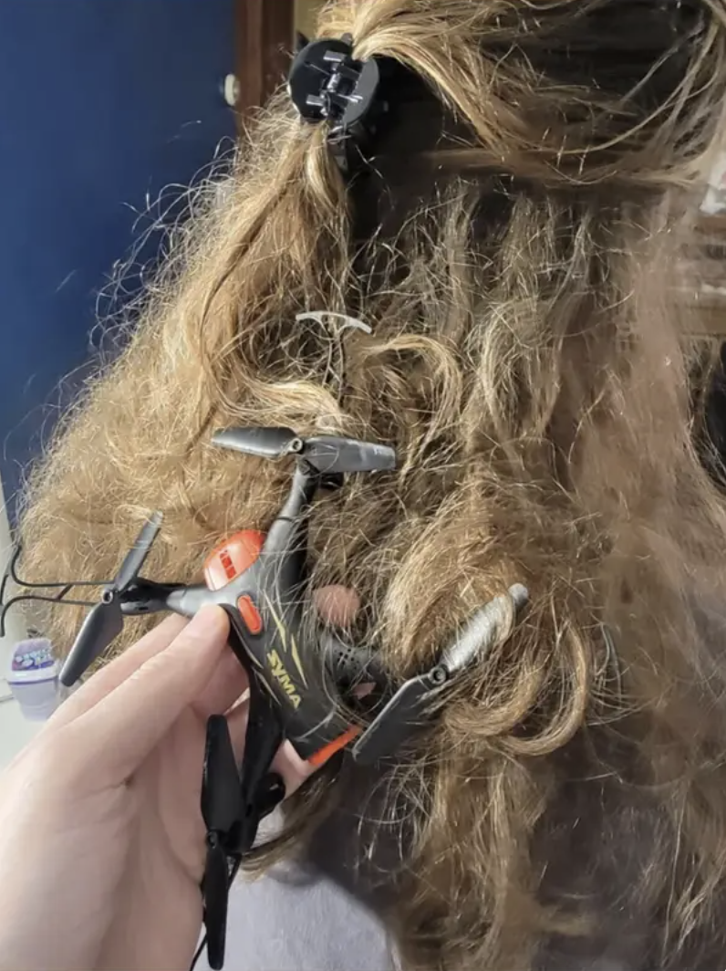 A drone stuck in someone's hair