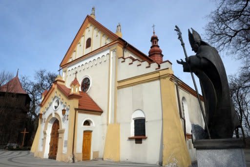 A sculpture by Czeslaw Dzwigaj of Pope John Paul II outside a church in Nowy Wisnicz near Krakow, Poland. The rise of a new anti-clerical party is symptomatic of growing pressure to reduce the traditionally strong ties between Church and State as more liberal influences flood in from western Europe