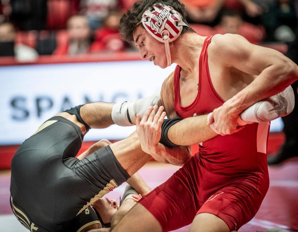 Indiana's Michael Spangler wrestles Purdue's Matt Ramos in the 125 lbs. match of the Indiana versus Purdue dual meet at Wilkinson Hall on Saturday, Jan. 27, 2024. Indiana won the meet 22-9.