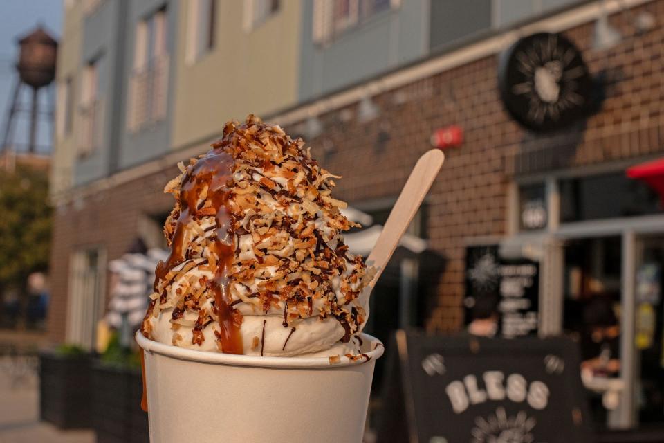 Cold Truth Soft Serve in Detroit serves vegan soft serve. Pictured is a sundae with sweet cream soft serve, dark chocolate drizzle, toasted coconut and caramel on July 16, 2023.