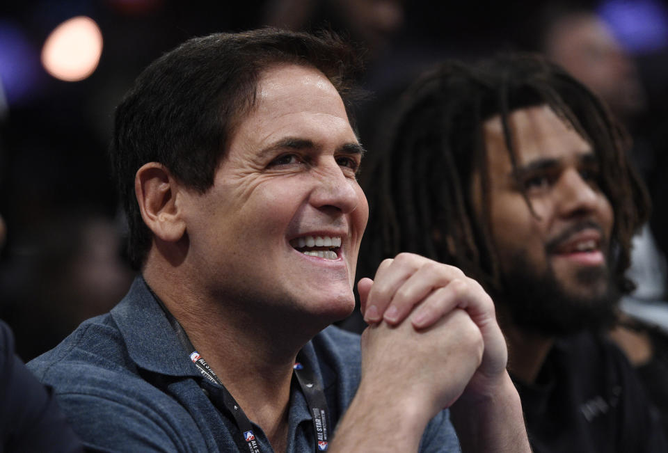 FILE - In this Saturday, Feb. 17, 2018 file photo, Dallas Mavericks owner Mark Cuban looks on from the crowd during NBA All-Star Saturday in Los Angeles. The NBA has fined outspoken Dallas Mavericks owner Mark Cuban $600,000 for comments about tanking during a podcast with Hall of Famer Julius Erving. Commissioner Adam Silver said the fine was for "public statements detrimental to the NBA." (AP Photo/Chris Pizzello, File)