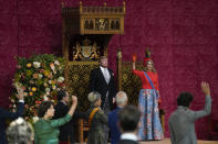 Queen Maxima and members of parliament stand for a triple salute to Dutch King Willem-Alexander after he marked the opening of the parliamentary year with a speech outlining the government's budget plans for the year ahead at the Grote Kerk, or Sint-Jacobus Kerk, (Great Church or St. James' Church) in The Hague, Netherlands, Tuesday, Sept. 21, 2021. (AP Photo/Peter Dejong)