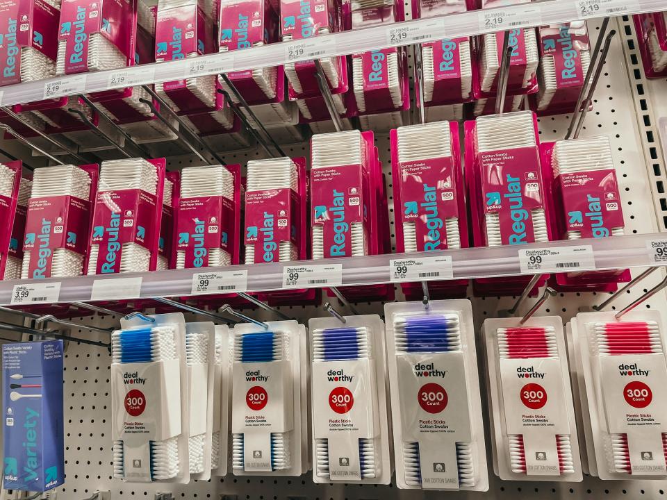 cotton swabs on the shelves of a drug store