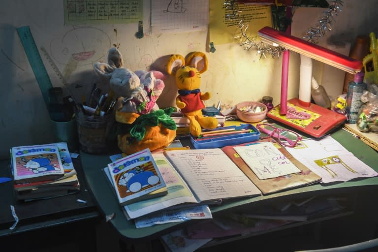 The study table of a eight-year-old abused girl at her home in Hanoi. The child still wails in her sleep, haunted by the memory of the attack