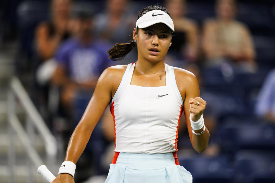 Emma Raducanu, of Britain, reacts scoring a point on Alize Cornet, of France, during the first round of the US Open tennis championships, Tuesday, Aug. 30, 2022, in New York. (AP Photo/Frank Franklin II)