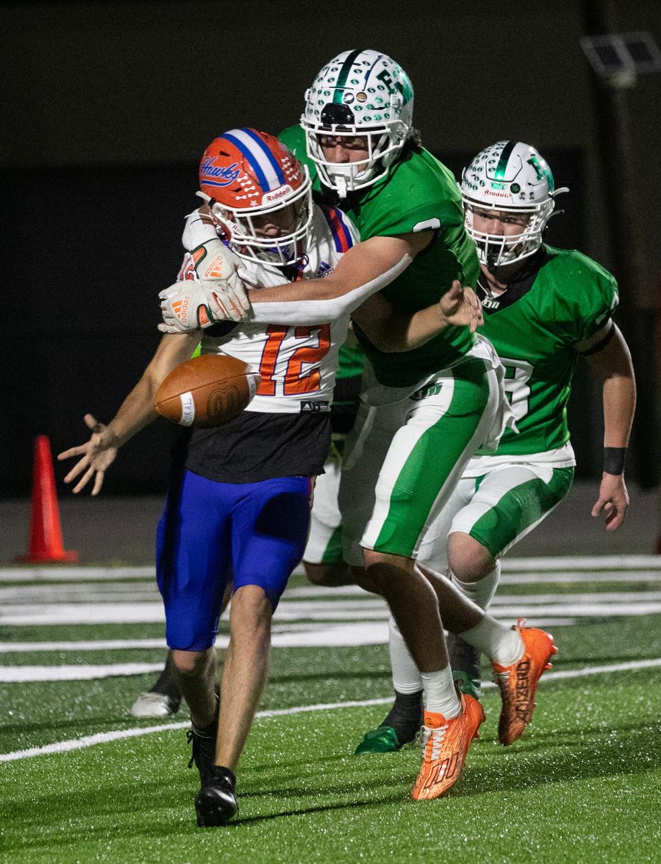 Grant Coppens of Fort Myers forces a funble by Blake Thomas of Cape Coral as he was trying to punt on Thursday night, Nov. 2, 2023, at Fort Myers High School.