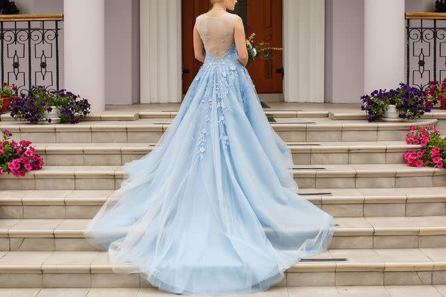 <p>Getty</p> A stock photo of a blue wedding dress