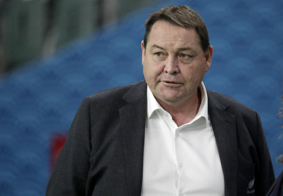 FILE - In this Oct. 2, 2019, file photo, All Blacks coach Steve Hansen watches his players warm up ahead of the Rugby World Cup Pool B game at Oita Stadium between New Zealand and Canada in Oita, Japan. Of the eight teams remaining in the Rugby World Cup four are coached by New Zealanders who, from similar beginnings, pursued divergent coaching careers before their paths intersected at this tournament. (AP Photo/Aaron Favila, File)