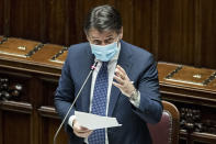 Italian Premier Giuseppe Conte addresses the Chamber of Deputies in Rome, Wednesday, Oct. 28, 2020. New nationwide restrictions aimed at limiting leisure activities to curb the spread of COVID-19 have been launched this week, they include closing restaurants and bars at 6 p.m., shutting down gyms and pools and all non-professional contact sports and closing theaters and cinemas. (Roberto Monaldo/LaPresse via AP)