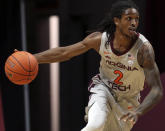 Virginia Tech's Cartier Diarra dribbles up the floor after grabbing a defensive rebound against Radford during an NCAA college basketball game, Wednesday Nov. 25, 2020, in Blacksburg Va. (Matt Gentry/The Roanoke Times via AP)