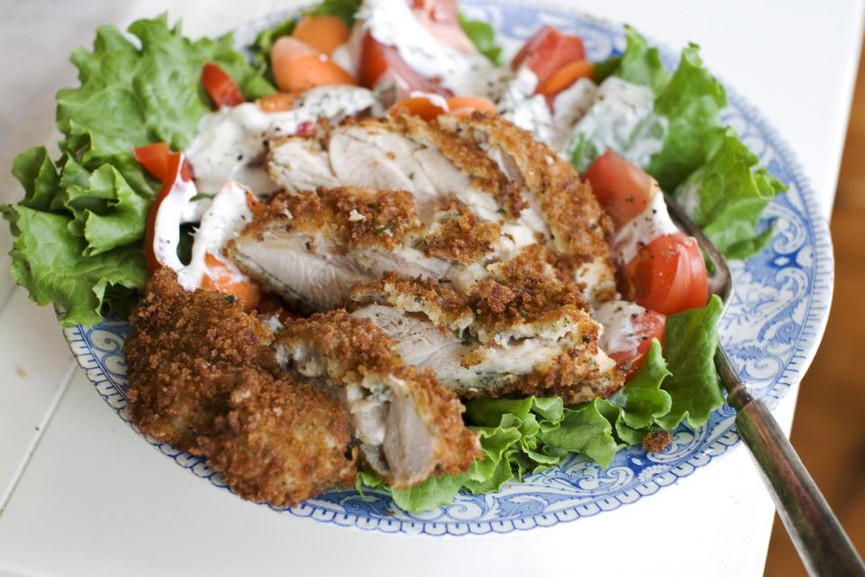 In this image taken on June 3, 2013, the best fried chicken you'll ever eat at home is shown served on a plate in Concord, N.H. (AP Photo/Matthew Mead)