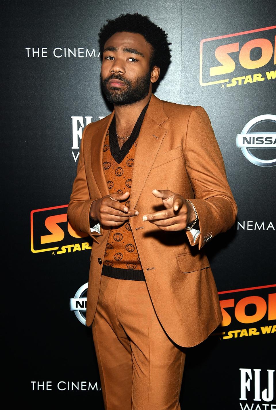 Donald Glover in caramel-hued Gucci at the Solo: A Star Wars Story NYC premiere.