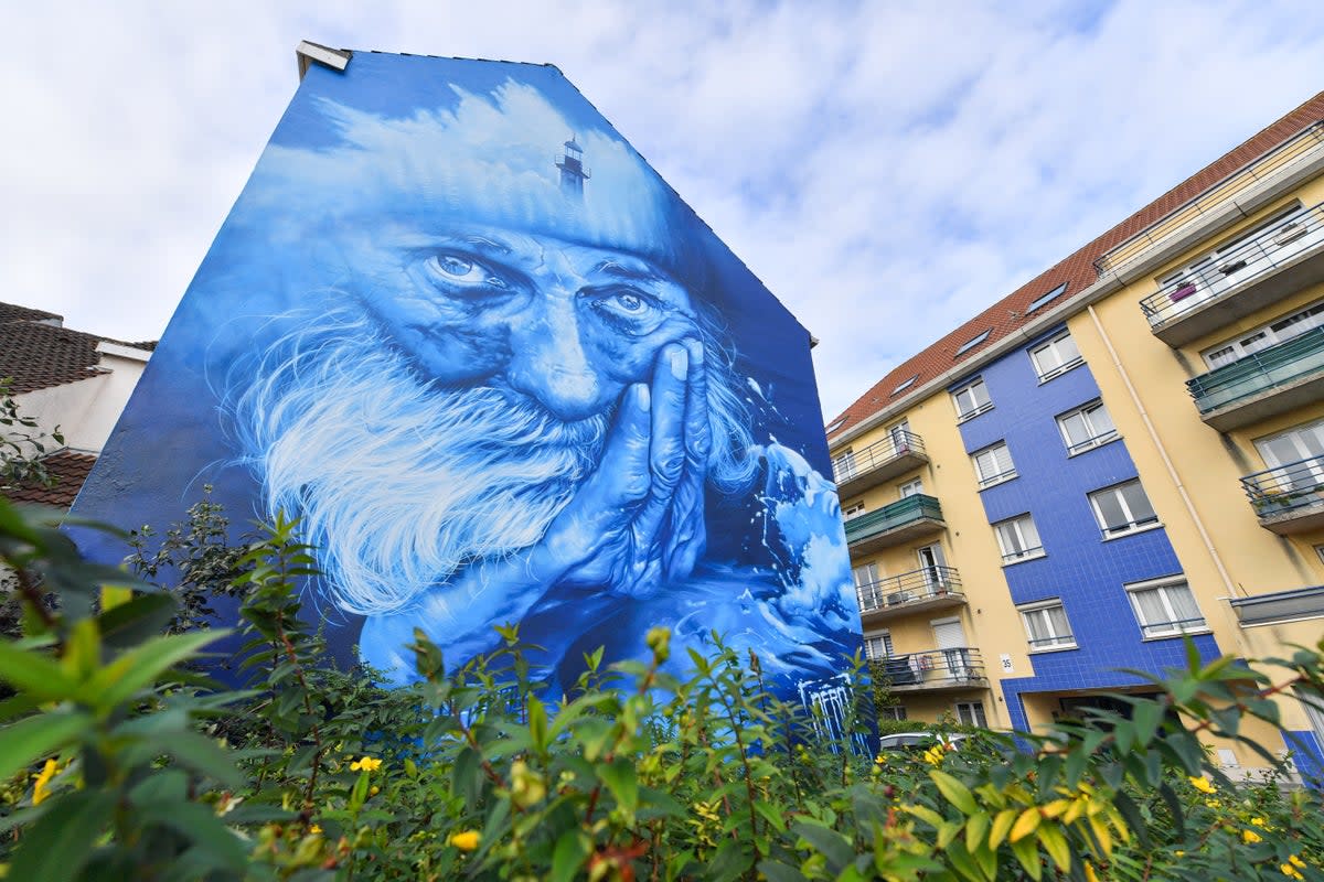 Calais’s streets are lined with thought-provoking street art (Yannick Cadar)